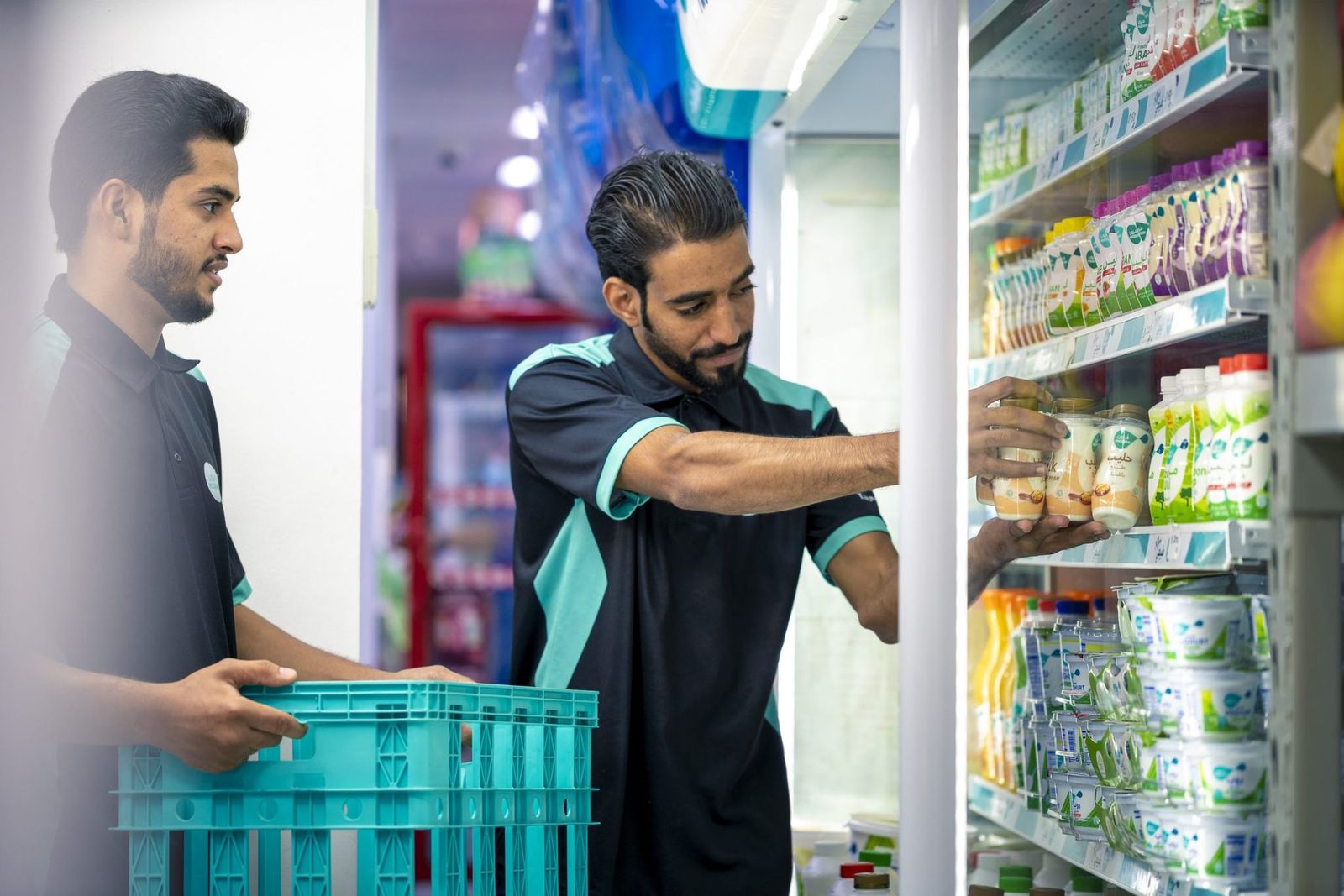 Mazoon merchandisers rotating stock on a retail shelf